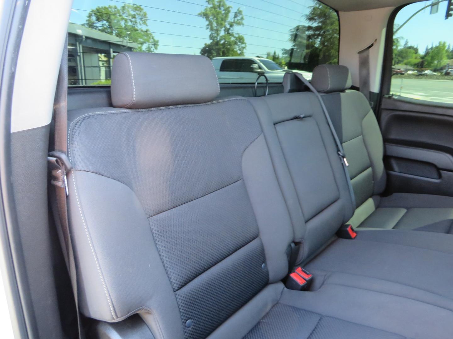 2018 White /BLACK Chevrolet Silverado 1500 LT (3GCPCREC7JG) with an 5.3L V8 OHV 16V engine, automatic transmission, located at 2630 Grass Valley Highway, Auburn, CA, 95603, (530) 508-5100, 38.937893, -121.095482 - Must see Pre Runner.... CST front lift spindals, Camburg UCA's, King Adjustable 2.5 Coil-overs, King 2.5 rear shocks, 35" Toyo RT Trail tires, 17" Method Race wheels, MZ front skid plate, G2 rear differntail cover, Full size bed mounted spare tire, Black Vinyl roof wrap, smoke tail lights and 3rd br - Photo#56